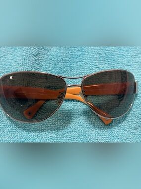 Coach Aviator Sunglasses with Brown Lenses and Orange Temples